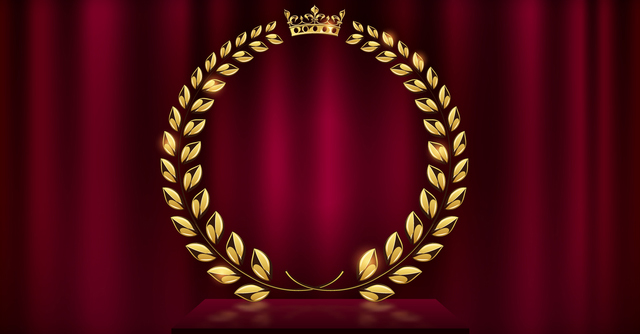 赤で統一された表彰舞台―月桂冠と王冠