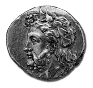 ランプサカス市（紀元前360 ～ 340 年頃）の発行した金のステタル（古代ギリシャの都市国家の硬貨）。ツタの花冠を頭に飾ったディオニュソス・プリアポスが描かれている。ルーブル美術館所蔵。