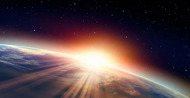 宇宙からから見た地球と日の出（人間の心の深層に宝石のように貴いもののイメージ）